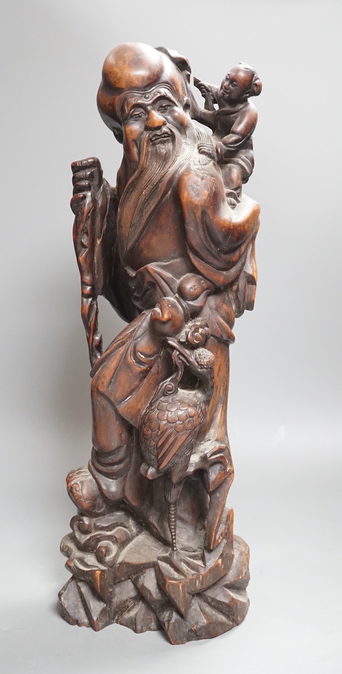 A large early 20th century Chinese hongmu Shou Lao group, 46.5cms high